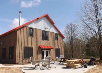 gable barn home with red roof