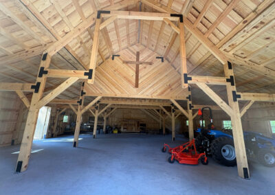 46x50 gambrel barn interior photo showing wooden cross set in the gambrel roof