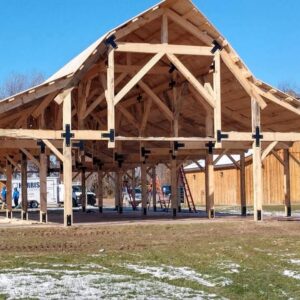Shop 5 Timber barn frame featuring Made in Michigan Plus Plates at structural beam connections